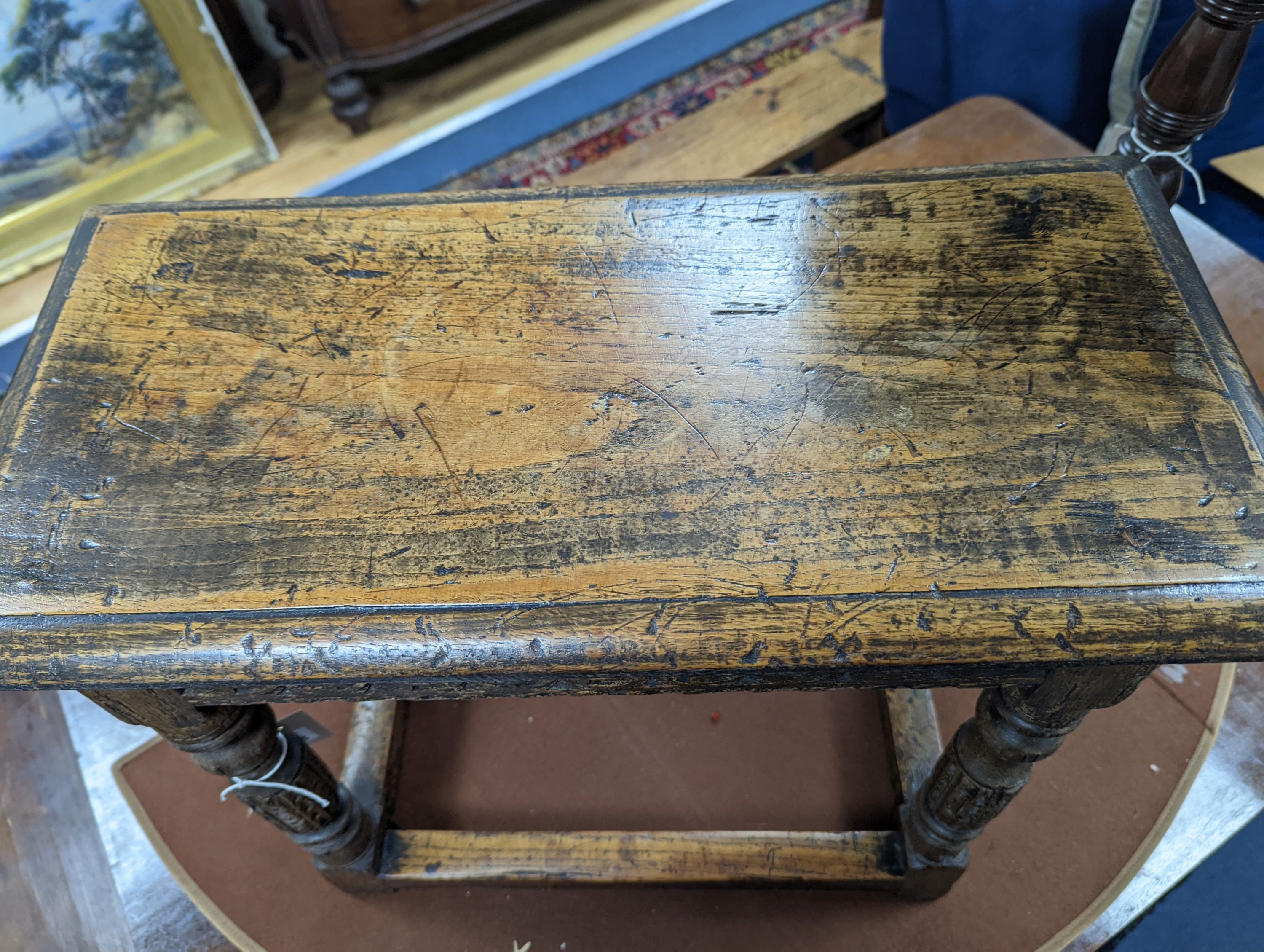 A 17th century style rectangular oak joint stool, width 56cm, depth 28cm, height 47cm